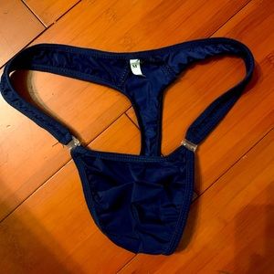 Mens navy thong with side snaps.